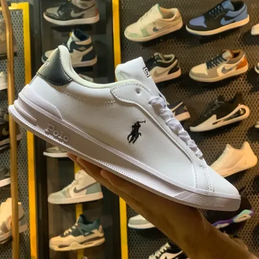 کتونی پولو رالف لورن کژوال (Polo Ralph Lauren White Black Heel) - رویه چرم سفید با پشت پاشنه مشکی و لوگوی چوگان‌باز | مستر کوالیتی