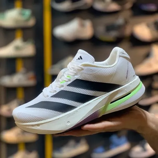 کفش دویدن و اسپرت زنانه آدیداس مدل Adidas Adizero Adios Pro / Boston - رنگ سفید مشکی با جزئیات نئونی | مستر کوالیتی